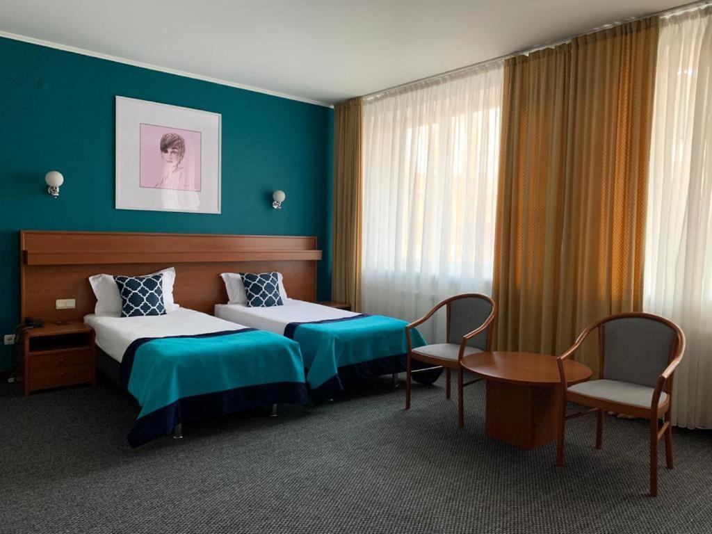 Mika City Hotel Алма Ата Екстериор снимка